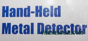 надпись hand-held metal detector